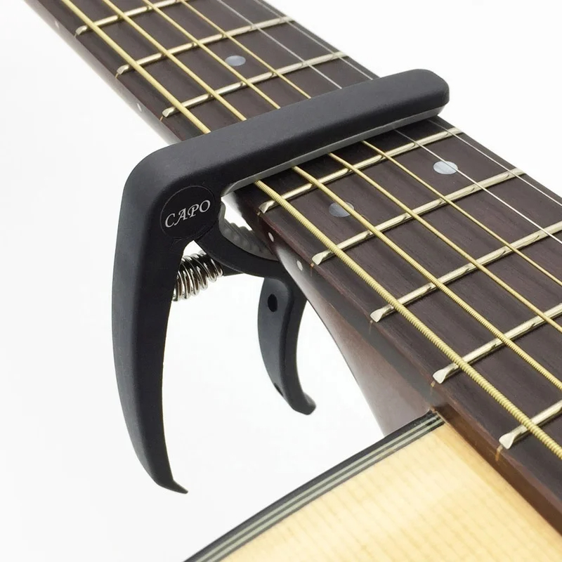 Plastic Guitar Capo for 6 Stri - Musical Instrument Gif recensie en prijs