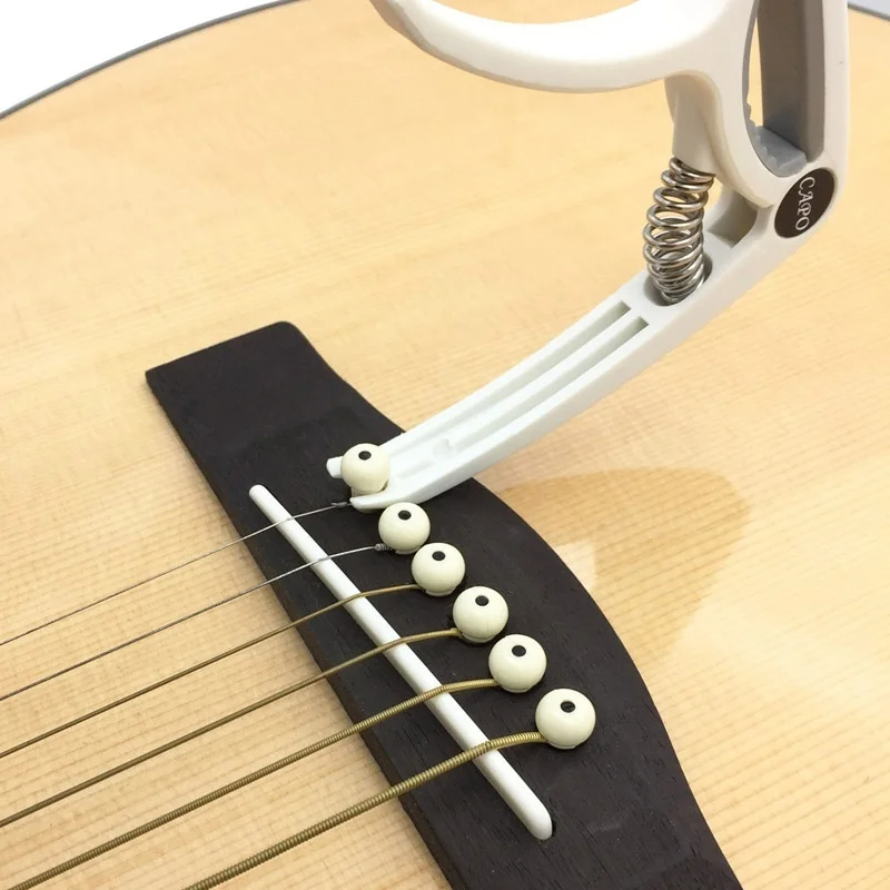 Plastic Guitar Capo for 6 Stri - Musical Instrument Gif recensie en prijs